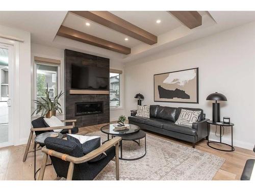 34 Longmire Close, Red Deer, AB - Indoor Photo Showing Living Room With Fireplace