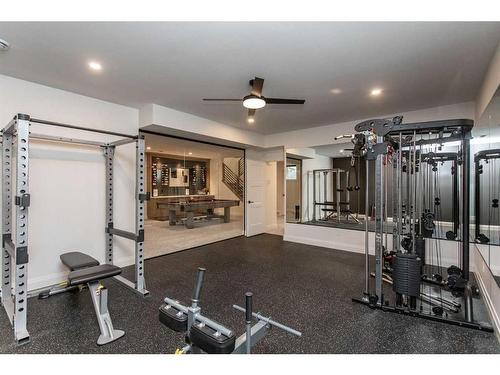 34 Longmire Close, Red Deer, AB - Indoor Photo Showing Gym Room