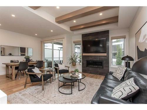 34 Longmire Close, Red Deer, AB - Indoor Photo Showing Living Room With Fireplace