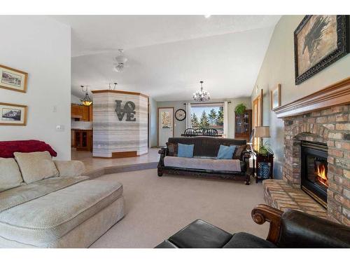 400005 Highway 761, Rural Clearwater County, AB - Indoor Photo Showing Living Room With Fireplace