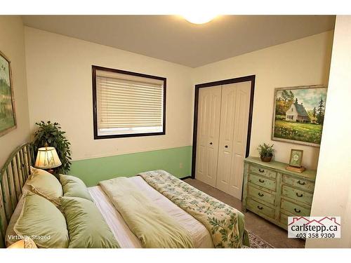 3 Lincoln Street, Sylvan Lake, AB - Indoor Photo Showing Bedroom