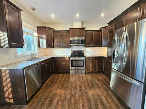 130-116 6 Avenue Ne, Slave Lake, AB - Indoor Photo Showing Kitchen With Double Sink