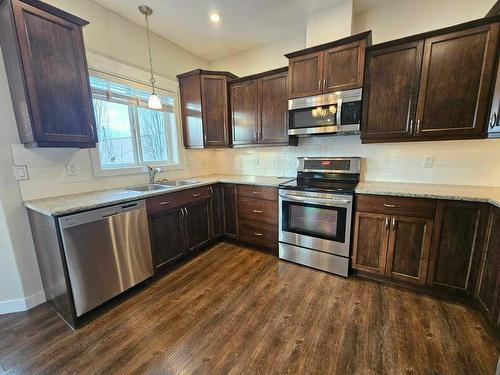 130-116 6 Avenue Ne, Slave Lake, AB - Indoor Photo Showing Kitchen With Double Sink