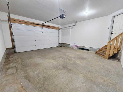 130-116 6 Avenue Ne, Slave Lake, AB - Indoor Photo Showing Garage