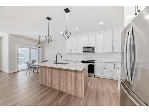 15 Rosse Place, Sylvan Lake, AB - Indoor Photo Showing Kitchen With Stainless Steel Kitchen With Upgraded Kitchen