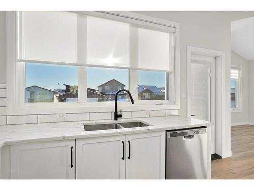 95 Livingston Close, Red Deer, AB - Indoor Photo Showing Kitchen With Double Sink