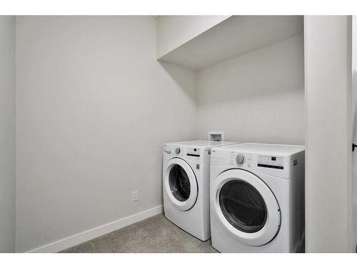 95 Livingston Close, Red Deer, AB - Indoor Photo Showing Laundry Room