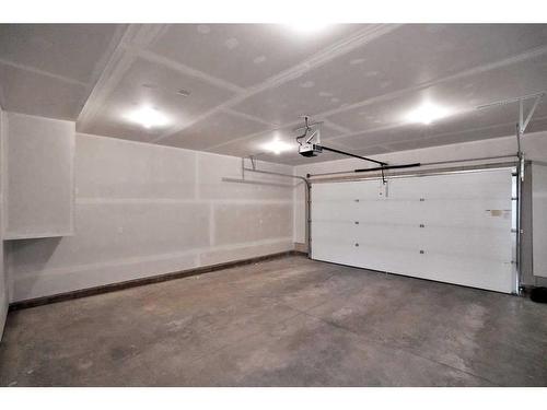 95 Livingston Close, Red Deer, AB - Indoor Photo Showing Garage