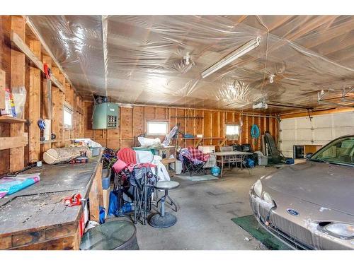 5213 50 Avenue, Ponoka, AB - Indoor Photo Showing Garage