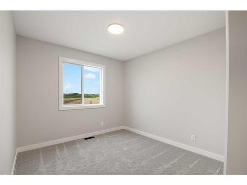 27 Gray Close, Sylvan Lake, AB - Indoor Photo Showing Other Room