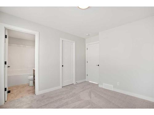 13 Gray Close, Sylvan Lake, AB - Indoor Photo Showing Other Room