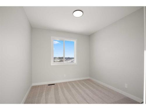 13 Gray Close, Sylvan Lake, AB - Indoor Photo Showing Other Room