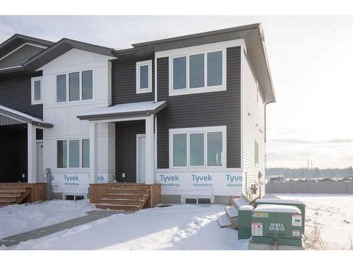 13 Gray Close, Sylvan Lake, AB - Outdoor With Facade