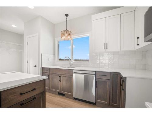 13 Gray Close, Sylvan Lake, AB - Indoor Photo Showing Kitchen With Upgraded Kitchen