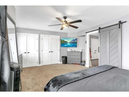 2 Coachman Way, Blackfalds, AB - Indoor Photo Showing Bedroom