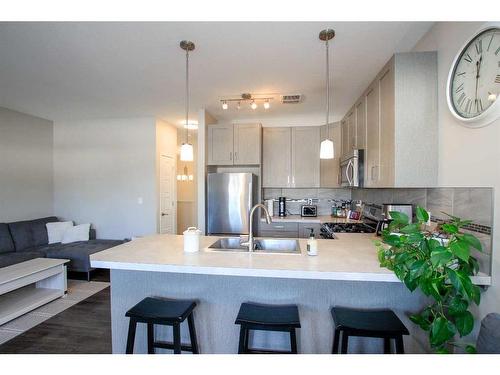 101 Crimson Court, Blackfalds, AB - Indoor Photo Showing Kitchen With Stainless Steel Kitchen With Double Sink With Upgraded Kitchen