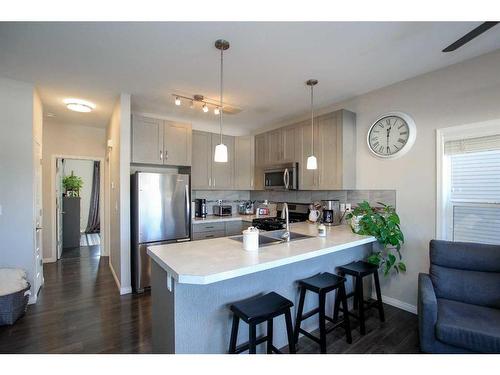 101 Crimson Court, Blackfalds, AB - Indoor Photo Showing Kitchen With Stainless Steel Kitchen With Double Sink