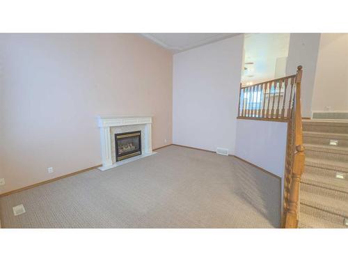 45 Kingston Drive, Red Deer, AB - Indoor With Fireplace