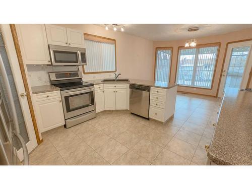 45 Kingston Drive, Red Deer, AB - Indoor Photo Showing Kitchen With Stainless Steel Kitchen With Double Sink