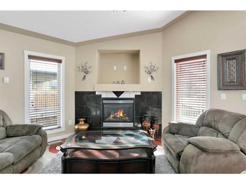 35 Oberg Court, Red Deer, AB - Indoor Photo Showing Living Room With Fireplace