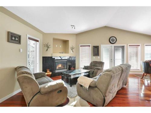 35 Oberg Court, Red Deer, AB - Indoor Photo Showing Living Room With Fireplace