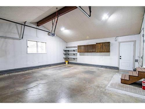 33 Munro Crescent, Red Deer, AB - Indoor Photo Showing Garage