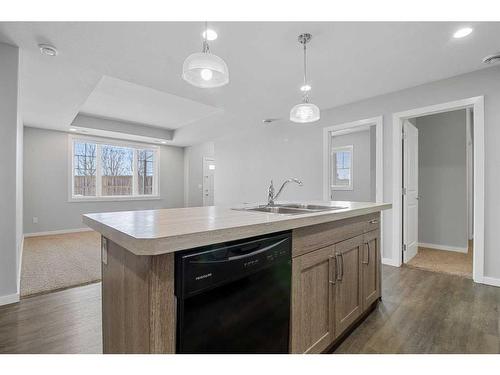 #103-44 Reid Court, Sylvan Lake, AB - Indoor Photo Showing Kitchen With Double Sink