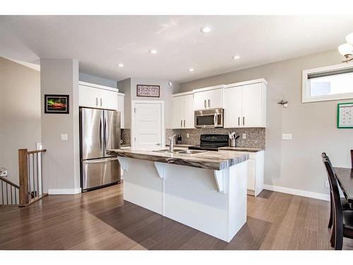 119 Cedar Square, Blackfalds, AB - Indoor Photo Showing Kitchen With Stainless Steel Kitchen