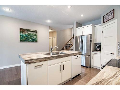 119 Cedar Square, Blackfalds, AB - Indoor Photo Showing Kitchen With Stainless Steel Kitchen With Double Sink