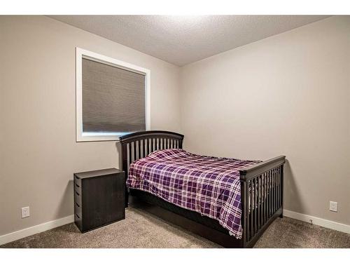 119 Cedar Square, Blackfalds, AB - Indoor Photo Showing Bedroom