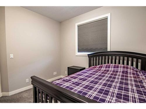 119 Cedar Square, Blackfalds, AB - Indoor Photo Showing Bedroom