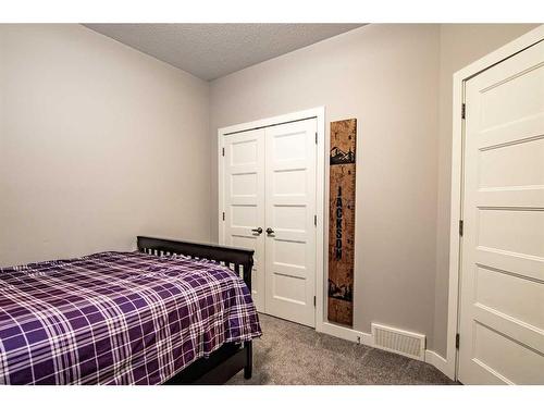 119 Cedar Square, Blackfalds, AB - Indoor Photo Showing Bedroom