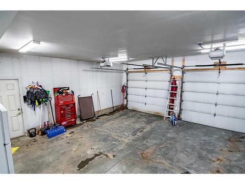 119 Cedar Square, Blackfalds, AB - Indoor Photo Showing Garage