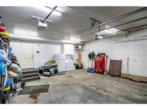 119 Cedar Square, Blackfalds, AB - Indoor Photo Showing Garage