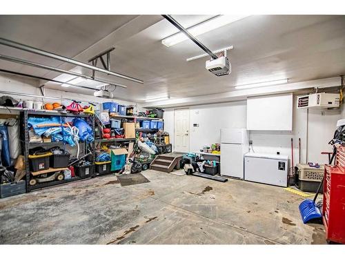 119 Cedar Square, Blackfalds, AB - Indoor Photo Showing Garage