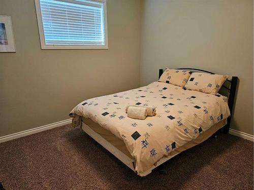 23-421003 Range Road 10, Rural Ponoka County, AB - Indoor Photo Showing Bedroom