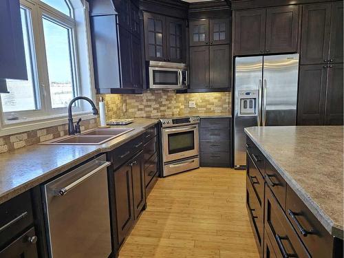 23-421003 Range Road 10, Rural Ponoka County, AB - Indoor Photo Showing Kitchen With Double Sink With Upgraded Kitchen