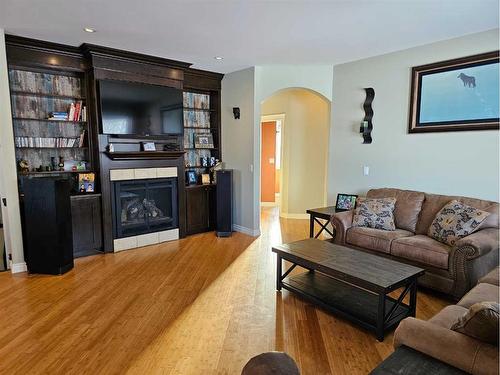 23-421003 Range Road 10, Rural Ponoka County, AB - Indoor Photo Showing Living Room With Fireplace