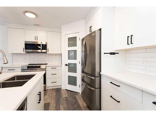 37 Ogilvie Close, Red Deer, AB - Indoor Photo Showing Kitchen With Stainless Steel Kitchen With Double Sink With Upgraded Kitchen