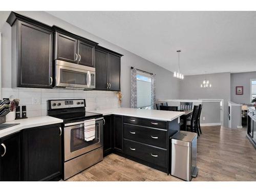 49 Aztec Crescent, Blackfalds, AB - Indoor Photo Showing Kitchen With Upgraded Kitchen