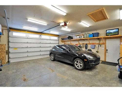 49 Aztec Crescent, Blackfalds, AB - Indoor Photo Showing Garage