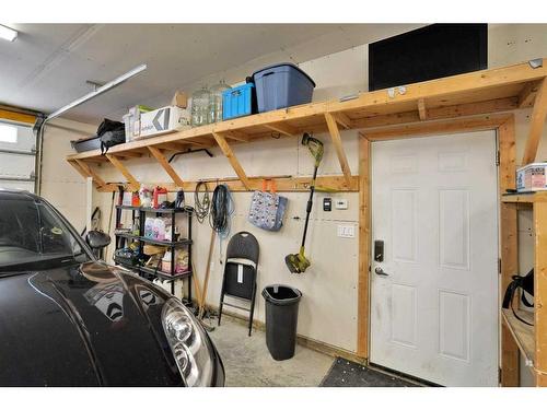 49 Aztec Crescent, Blackfalds, AB - Indoor Photo Showing Garage