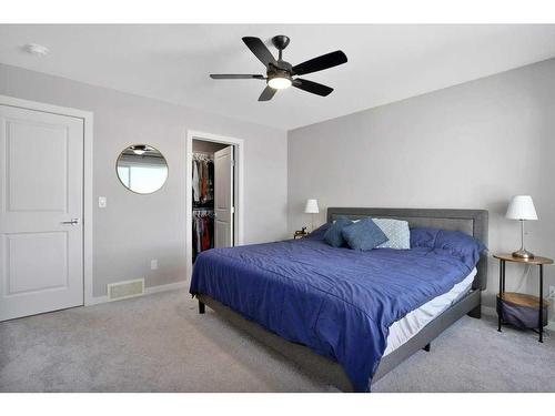 89 Memorial Parkway, Rural Red Deer County, AB - Indoor Photo Showing Bedroom