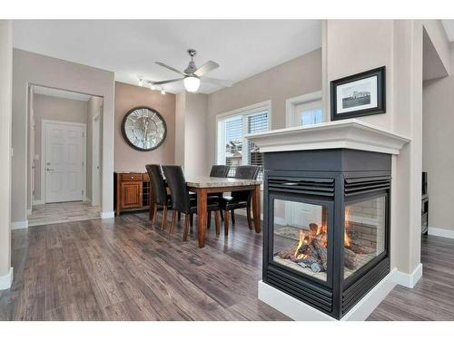 2 Garrison Place, Red Deer, AB - Indoor Photo Showing Dining Room With Fireplace