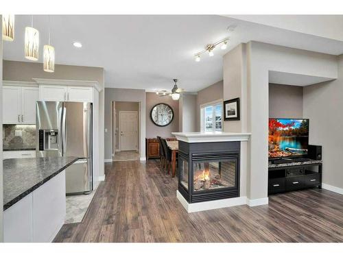 2 Garrison Place, Red Deer, AB - Indoor With Fireplace