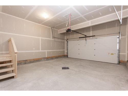 34 Thayer Close, Red Deer, AB - Indoor Photo Showing Garage