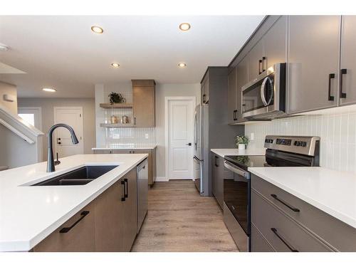 34 Thayer Close, Red Deer, AB - Indoor Photo Showing Kitchen With Double Sink With Upgraded Kitchen