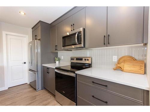 34 Thayer Close, Red Deer, AB - Indoor Photo Showing Kitchen With Stainless Steel Kitchen With Upgraded Kitchen