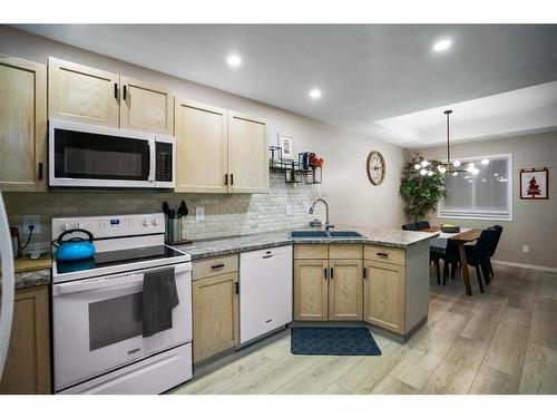 5304 58 Street Close, Camrose, AB - Indoor Photo Showing Kitchen With Double Sink