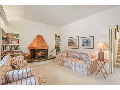 27 Selkirk Boulevard, Red Deer, AB - Indoor Photo Showing Living Room With Fireplace